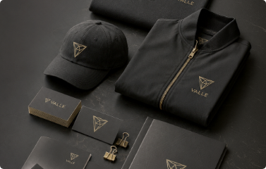 Valle Branding branded uniforms, hat, zipper jacket, business cards, and printed materials